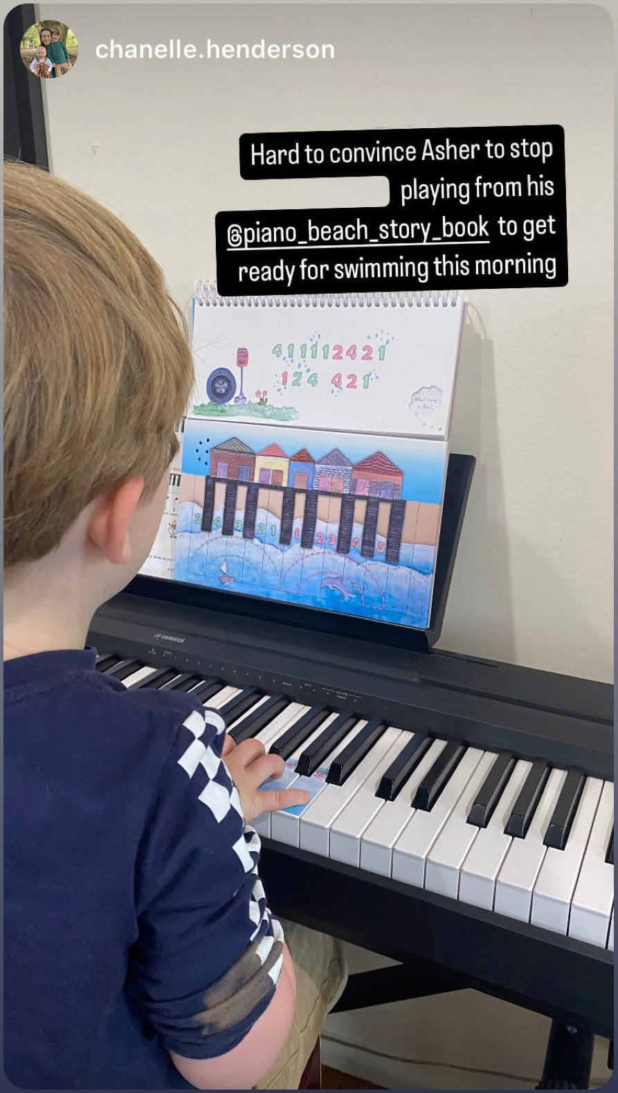 Boy uses Piano Beach story book with piano