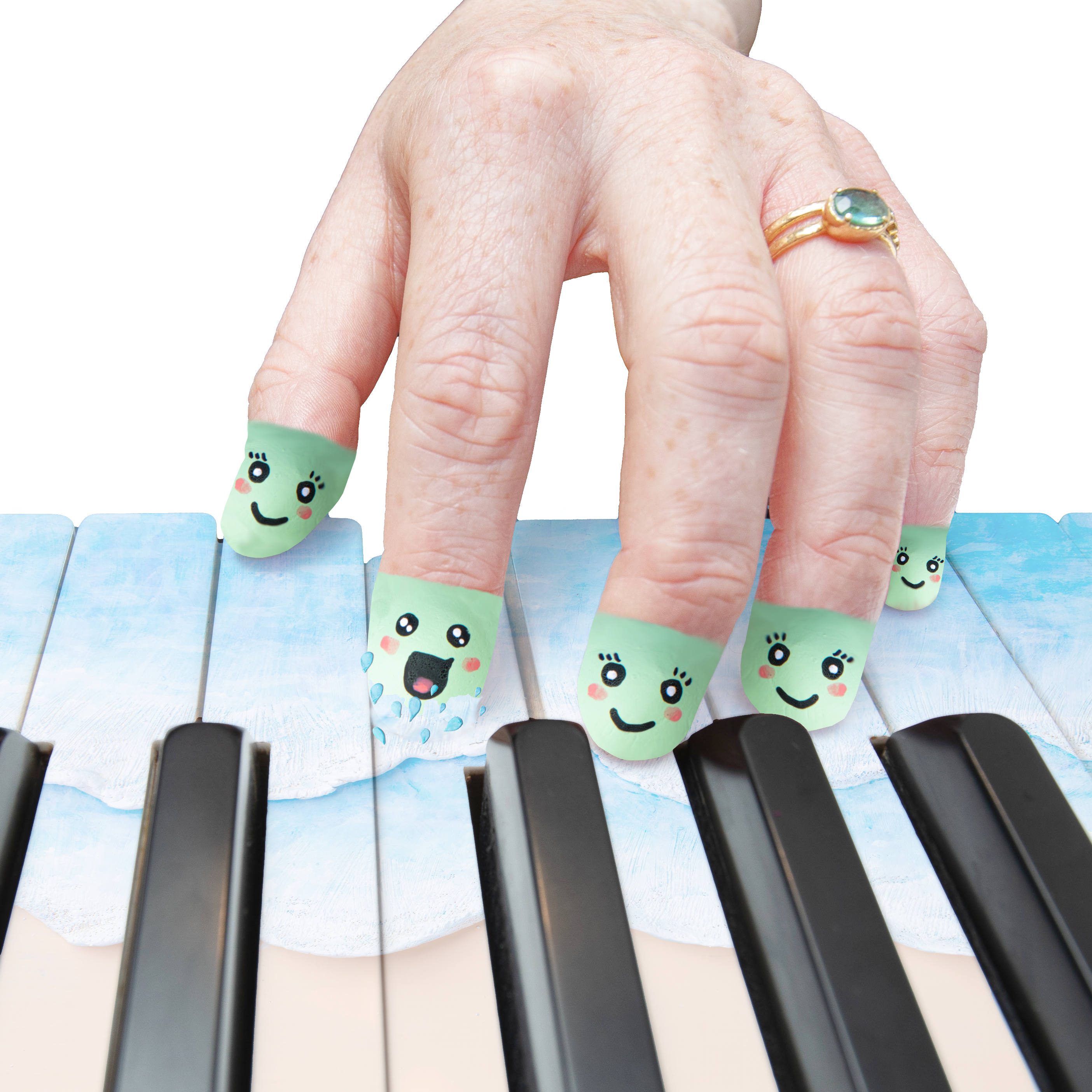 Piano Beach story book illustration. A hand decorated with colourful faces rests on a piano keyboard.